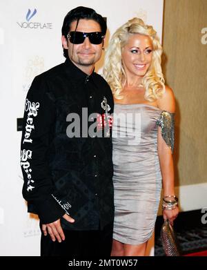 Corey Feldman and his girlfriend arrive at the Beverly Hilton Hotel for 'Forever Michael', a memorial event to celebrate the life of legendary pop singer Michael Jackson who unexpectedly past away on June 25, 2009 from heart failure, shocking fans, family and friends alike. Los Angeles, CA. 06/26/10. Stock Photo