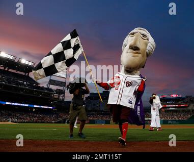 Washington Nationals' mascot Thomas Jefferson runs the warning track in  between innings as the Washington Nationals play the Philadelphia Phillies  at Nationals Park in Washington on April 13, 2009. (UPI Photo/Kevin Dietsch