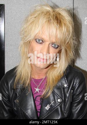 Finnish rock musician Michael Monroe (Matti Fagerholm) poses backstage at the 2010 Download Festival.  With a career spanning three decades the 47-year-old glam rock star has produced six solo albums and several with the band Hanoi Rocks. Derby, UK. 06/12/10.  . Stock Photo