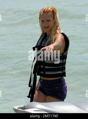 Swiss TV host and actress Michelle Hunziker spends an afternoon jetskiing with boyfriend Tomaso Trussardi during a visit to Miami Beach, FL. 4th June 2012. Stock Photo