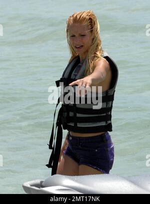 Swiss TV host and actress Michelle Hunziker spends an afternoon jetskiing with boyfriend Tomaso Trussardi during a visit to Miami Beach, FL. 4th June 2012. . Stock Photo