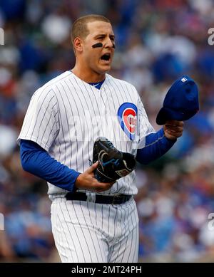 Chicago Cubs' Anthony Rizzo talks to Milwaukee Brewers' Christian Yelich  during the seventh inning of a baseball game Saturday, April 6, 2019, in  Milwaukee. (AP Photo/Aaron Gash Stock Photo - Alamy