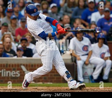 The Chicago Cubs' Javier Baez hits a grand slam in the sixth inning against  the New York Mets at Wrigley Field in Chicago on Wednesday, April 21, 2021.  (Photo by Chris Sweda/Chicago