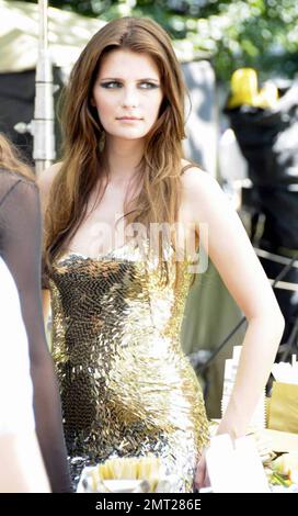 Mischa Barton films a scene on the set of her new movie 'The Beautiful Life' and takes a break for a makeup touch up and a smoke. New York, NY. 8/10/09. Stock Photo