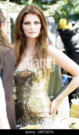 - Mischa Barton films a scene on the set of her new movie 'The Beautiful Life' and takes a break for a makeup touch up and a smoke. New York, NY. 8/10/09.  . Stock Photo