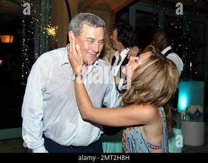 EXCLUSIVE!! Sol Kerzner kisses his wife Heather Kerzner as he