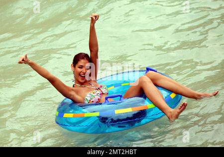 Exclusive!! Miss Universe Dayana Mendoza gets some thrills and even some relaxation on the water rides and slides at Atlantis Paradise Island. Paradise Island, Bahamas. 6/6/09. . Stock Photo