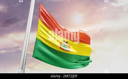 bolivia waving flag in beautiful sky. Stock Photo