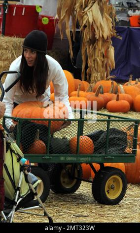 Soleil Moon Frye shops for ther perfect pumpkin with her husband Jason Goldberg and their two daughters, Poet and Jagger at Mr Bones Pumpkin Patch in West Hollywood, CA. 10/16/10 Stock Photo