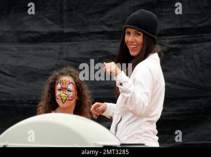 Soleil Moon Frye shops for ther perfect pumpkin with her husband Jason Goldberg and their two daughters, Poet and Jagger at Mr Bones Pumpkin Patch in West Hollywood, CA. 10/16/10 Stock Photo