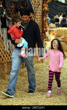 Soleil Moon Frye shops for ther perfect pumpkin with her husband Jason Goldberg and their two daughters, Poet and Jagger at Mr Bones Pumpkin Patch in West Hollywood, CA. 10/16/10 Stock Photo