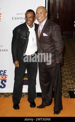 Sugar Ray Leonard and Hines Ward attend the 18th Annual Race to Erase MS event at the Hyatt Regency Century Plaza in Los Angeles, CA. 04/29/11. Stock Photo