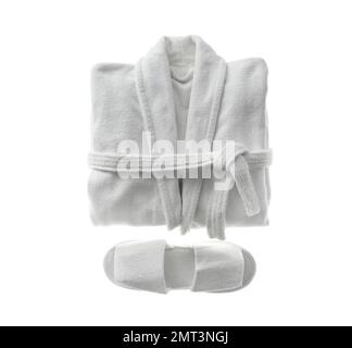 Clean folded bathrobe and slippers isolated on white, top view Stock Photo