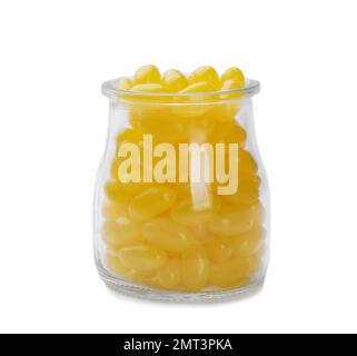 Tasty small lemon drops in glass jar isolated on white Stock Photo