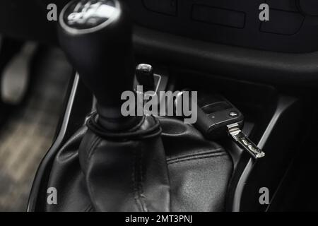 Key in new modern automobile. Car buying Stock Photo