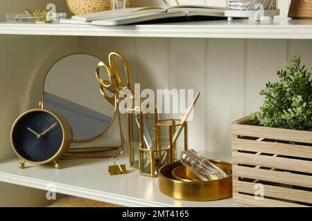 White shelving unit with different decorative elements Stock Photo