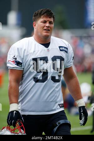 New England Patriots center James Ferentz (65) heads for the bench against  the Houston Texans during the first half of an NFL football game Sunday,  Oct. 10, 2021, in Houston. (AP Photo/Justin