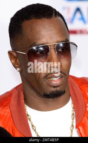 Sean Combs (aka Diddy) poses for photographers on the pink carpet ahead of the 2011 NBA All-Star game held at the Staples Center. Los Angeles, CA. 02/20/11. Stock Photo