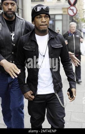 American pop and R&B artist Ne-Yo (Shaffer Smith) arrives at BBC Radio 1 with his bodyguard in tow for an interview at the studio.  The musician will soon be heading to Australia and Brazil for a number of summer concerts. London, UK. 07/08/10.   . Stock Photo
