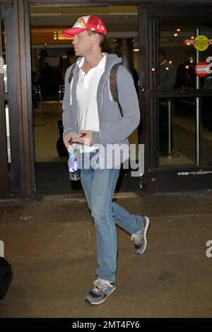 EXCLUSIVE!! Neil Patrick Harris arrives at Los Angeles International Airport. Los Angeles, CA. 13th December 2011. Stock Photo