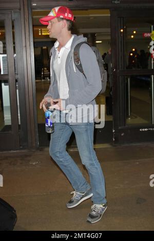 EXCLUSIVE!! Neil Patrick Harris arrives at Los Angeles International Airport. Los Angeles, CA. 13th December 2011. Stock Photo