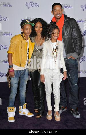 Will Smith, Jada Pinkett Smith, Willow Smith and Jaden Smith at the premiere of 'Justin Bieber: Never Say Never' at Nokia Theatre, LA Live. Los Angeles, CA. 2/8/11. Stock Photo