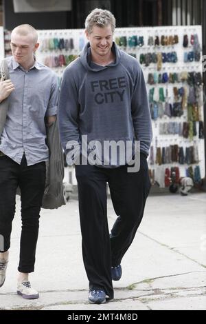 New father Eric Dane looks happy and healthy as he and some friends leave Kings Road Cafe.  Eric and wife Rebecca Gayheart welcomed their first child, daughter Billie Beatrice, into the world on March 3. Los Angeles, CA. 03/25/10.     . Stock Photo