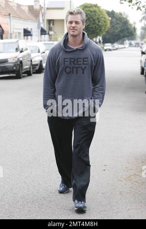 New father Eric Dane looks happy and healthy as he and some friends leave Kings Road Cafe.  Eric and wife Rebecca Gayheart welcomed their first child, daughter Billie Beatrice, into the world on March 3. Los Angeles, CA. 03/25/10.   . Stock Photo