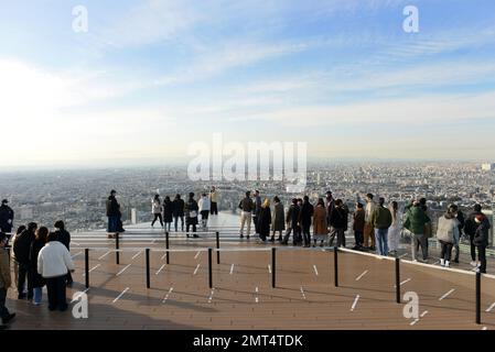 Tourist enjoying the views from the Shibuya Sky rooftop observation deck on top of the Scramble Square building in Shibuya, Tokyo, Japan. Stock Photo