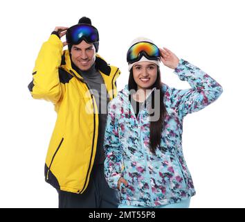 Couple wearing stylish winter sport clothes on white background Stock Photo