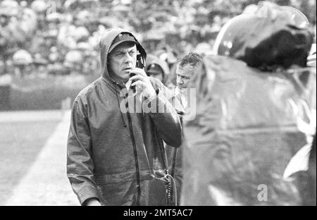 Minnesota Vikings head coach Bud Grant, wearing rain gear and a telephone  headset, signals for an official from the sidelines during the Rams-Vikings  playoff game in Los Angeles, Dec. 26, 1977. (AP Photo Stock Photo - Alamy