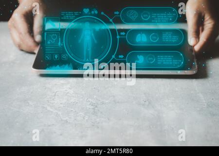 Medical technology, treatment, icon showing body work, instrument for checking heart on the dark background represents exercise, copy space. Stock Photo