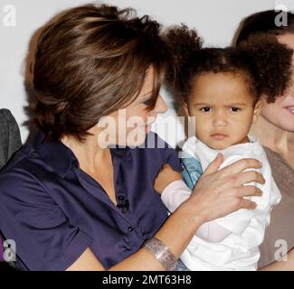 Natasha Kaplinsky and Iris attend the launch of Save The Children's 2011 'No Child Born To Die' campaign held at The Lincoln Centre.  Celebrity charity ambassadors attended the campaign launch which is 'calling for an end to the deaths of millions of children who die from easily preventable causes every year.'  London, UK. 01/24/11. Stock Photo