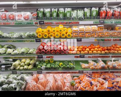 Various fresh vegetables on shelf in supermarket for background Stock Photo