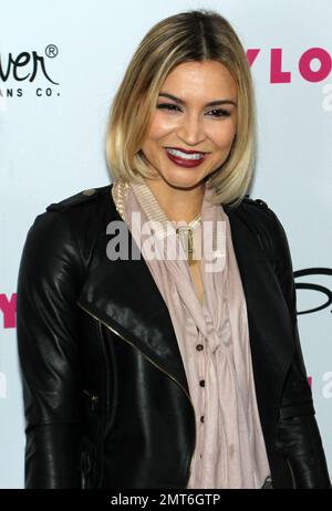 Actress Samaire Armstrong poses for photographers on the red carpet at NYLON magazineÕs 12th anniversary party held at Tru and hosted by the ravishing and beautiful stars of the new epic action fantasy movie 'Sucker Punch'. Los Angeles, CA. 03/24/11. Stock Photo