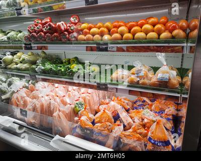 Various fresh vegetables on shelf in supermarket for background Stock Photo