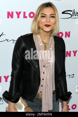 Actress Samaire Armstrong poses for photographers on the red carpet at NYLON magazineÕs 12th anniversary party held at Tru and hosted by the ravishing and beautiful stars of the new epic action fantasy movie 'Sucker Punch'. Los Angeles, CA. 03/24/11. Stock Photo