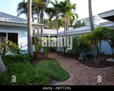 Exclusive!! This is the new Florida home of Olivia Newton-John and John Easterling. The 5,500 square feet abode has four bedrooms, four bathrooms and a dock. The 'blue water' home also has views of the Jupiter Lighthouse and over an acre of property. The couple purchased the home that was listed by realtor Tom DiSarno of Golden Bear Realty for $4.1m. Over the years, the small community of Jupiter Inlet has had other famous residents including crooner Perry Como. Miami, FL. 6/22/09. Stock Photo