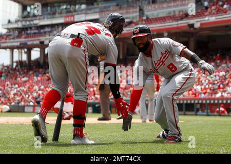 Washington Nationals Brian Goodwin (R) celebrates with Bryce Harper (L)  after hitting a solo home run against the Chicago Cubs in the ninth inning  at Wrigley Field on August 6, 2017 in