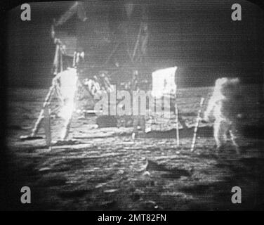 https://l450v.alamy.com/450v/2mt82fn/file-in-this-july-20-1969-file-photo-apollo-11-astronaut-neil-armstrong-right-trudges-across-the-surface-of-the-moon-leaving-behind-footprints-moon-dust-collected-by-armstrong-during-the-first-lunar-landing-is-being-sold-at-a-new-york-auction-the-lunar-dust-plus-some-tiny-rocks-that-armstrong-also-collected-are-zipped-up-in-a-small-bag-and-are-worth-an-estimated-2-million-to-4-million-theyre-just-some-of-the-items-linked-to-space-travel-that-sothebys-is-auctioning-off-to-mark-the-48th-anniversary-of-the-first-lunar-landing-on-july-20-ap-photo-file-2mt82fn.jpg