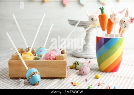 Different delicious sweet cake pops on table. Easter holiday Stock Photo