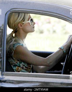 EXCLUSIVE!! Paris Hilton drives out of her gated community, the first  pictures of Hilton since