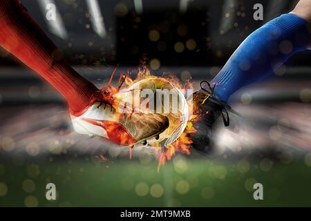 CG image of soccer players hitting the ball with fire Stock Photo