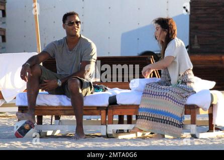 Patrick Kluivert, former Dutch footballer and current NEC Nijmegen Assistant Coach, enjoys a day on the beach playing soccer with his wife, Rossana Lima and his son, Shane Patrick, during a winter holiday in Miami Beach, FL. 1/5/11.    . Stock Photo