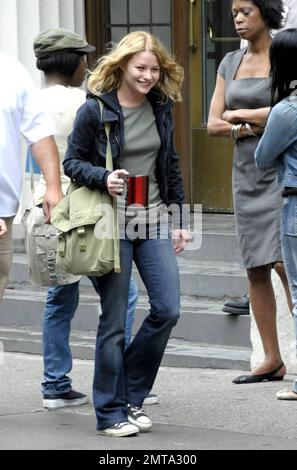 'Twilight Saga: New Moon' star Robert Pattinson films a scene with Emilie de Ravin on the set of his new film 'Remember Me,' due in theaters in 2010. New York, NY. 7/2/09. Stock Photo