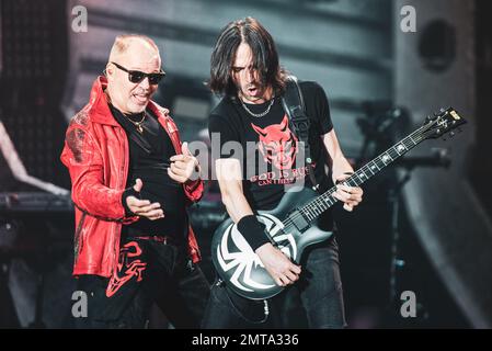 STADIO OLIMPICO, TURIN, ITALY: Vince Pastano (R), guitarist of the Italian rocker Vasco Rossi (L), performing live on stage for the “LIVE KOM” tour Stock Photo