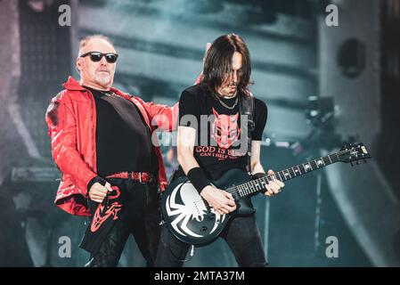 STADIO OLIMPICO, TURIN, ITALY: Vince Pastano (R), guitarist of the Italian rocker Vasco Rossi (L), performing live on stage for the “LIVE KOM” tour Stock Photo