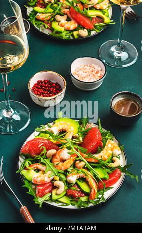 Avocado And Grapefruit Salad In A White Plate On A White Background 