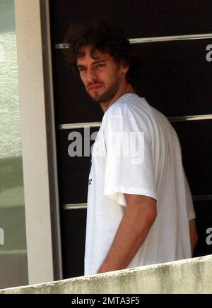 A day after winning the NBA Championship, Lakers center Pau Gasol dresses down and leaves his home to run some errands, carrying along some dress shirts. Redondo Beach, CA. 6/18/10. Stock Photo