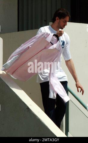 A day after winning the NBA Championship, Lakers center Pau Gasol dresses down and leaves his home to run some errands, carrying along some dress shirts. Redondo Beach, CA. 6/18/10. . Stock Photo